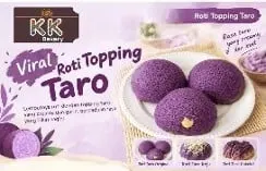 Poster Roti Topping Taro berisi roti bulat ungu di atas piring, satu dibelah memperlihatkan isian krem