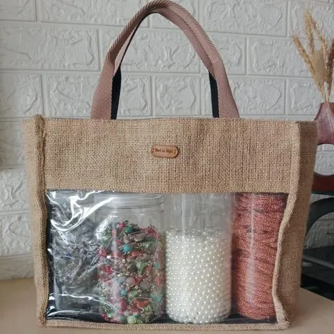 Tas jinjing goni dengan jendela plastik bening berisi toples manik, mutiara imitasi dan gulungan benang